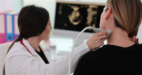 Closeup Of Woman Having Ultrasound Scan Of Neck Doctor Stock Video