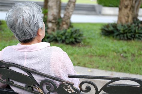 Old Elder Woman Resting In Garden Elderly Female Relaxing Outdoors