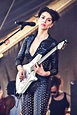 Annie Clark performing at the Osheaga Music and Arts Festival - Leather ...