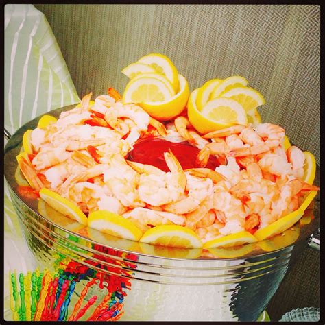 Serve in a platter at a party so people can simply dip the poached shrimp in the tangy sauce. Shrimp cocktail displayed in an ice bucket. Functional and cute | Blair shower | Pinterest ...