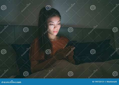 Phone In Bed Tired Asian Woman Staying Up Late At Night Using Mobile Cellphone Addicted To