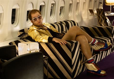 Elton john and taron egerton. First Trailer for Rocketman Reveals Taron Egerton as Elton ...