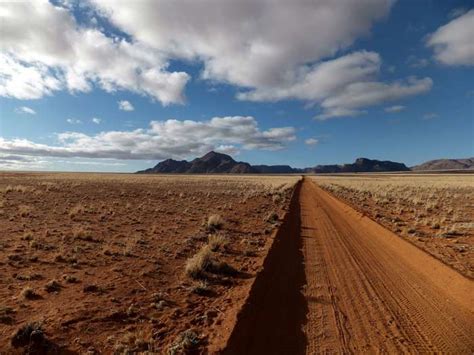 Arid Barren Clouds Desert Dirt Road Land Landscape Mountains