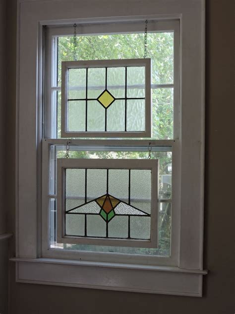 Antique Stained Glass Windows Hanging In Old Window