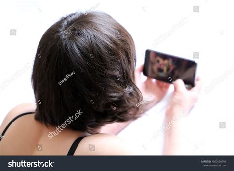 Woman Watching Porn Video On Smartphone Stock Photo