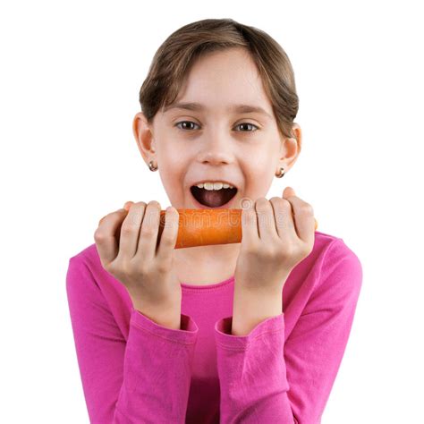 Happy Girl Eating a Large Carrot Stock Image - Image of merriment ...