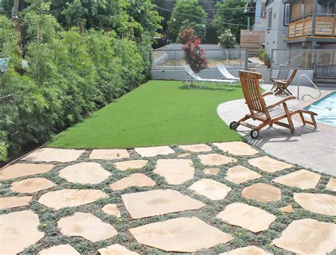 Artificial Turf And Flagstones With Ground Cover Contemporary