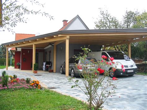 Modernes fertighaus mit carport und eingangsüberdachung. Lappi & Lappi, Holzbau aus der Steiermark - Carport