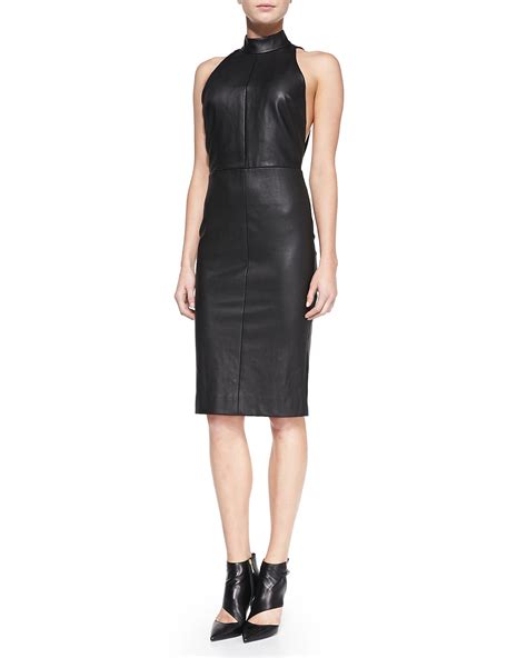 Textured stripe frayed ruffle hem vince camuto. Tamara mellon Fitted Leather Halter Dress With Open Back ...