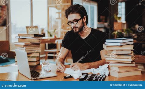 Pensive Freelance Text Writer Working At Desk Stock Photo Image Of