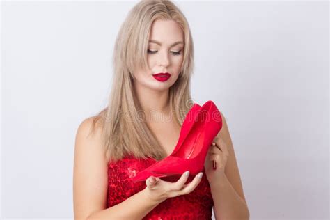 Blond Woman Holding Red High Heels In Her Hands Stock Image Image Of Female People 128481363