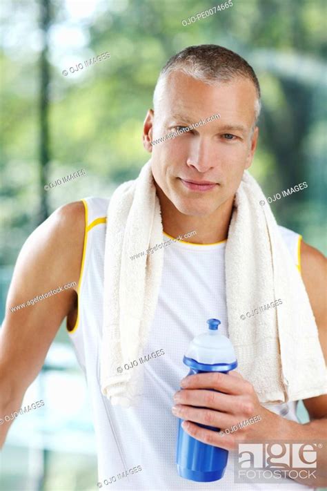 Man Drinking Water After Exercise Stock Photo Picture And Royalty