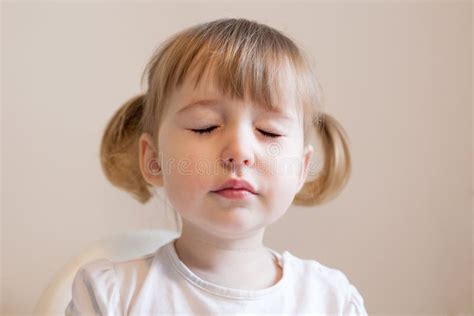 Funny Little Girl With Closed Eyes Stock Photo Image Of Positive