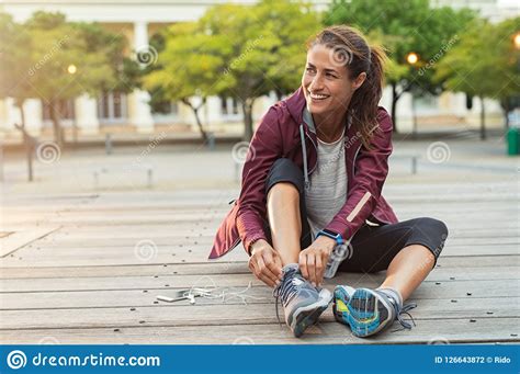 Sport Woman Taking A Break After Exercises On Bench In Gymtired Young