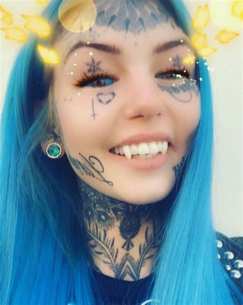 Woman Transforms Herself Into Blue Eyes White Dragon With Fangs Ladbible