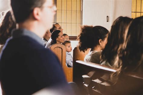 Families Seated In Pews During Church Service Church Stock Photos
