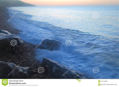 Blurred Sea Waves At Sunrise Stock Photo Image Of Holiday Sunrise
