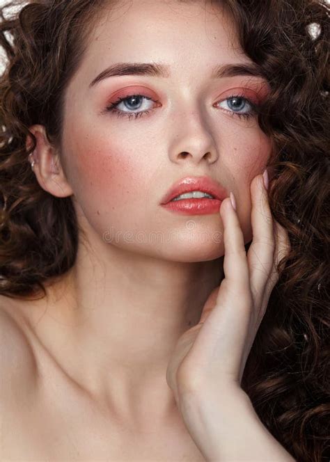 Beautiful Woman Face With Curly Hair Nude Shoulders Cosmetology And Spa Or Hair Care Concept On