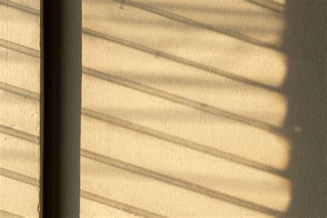 Sunlight Shadow On The Wall From The Louver Window Stock Photo Image