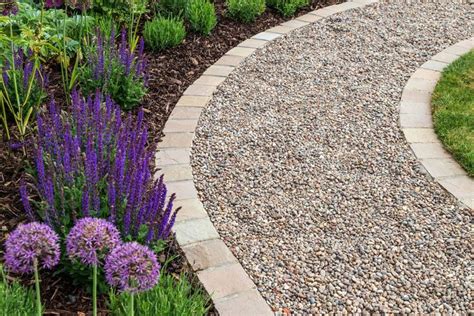 How To Lay A Budget Friendly Gravel Path Gravel Garden Pea Gravel