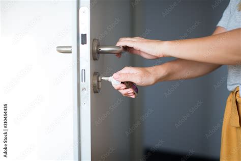 Woman Hands Opening A Door With Keys Close Up Hand Unlocks Key Lock