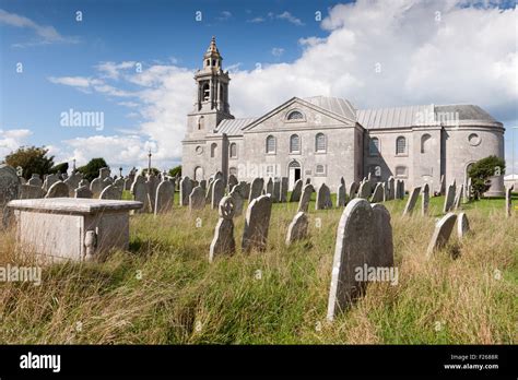 st george s church portland dorset uk showing both church and graveyard in bright sun stock