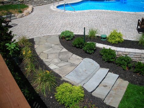Pool And Paver Patio With Natural Stone Walkway And Steps Built By