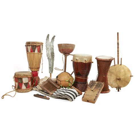Two African Instruments Three African Drums A Rattle Sanza A