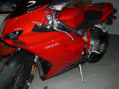 The carbon fiber used is the same of the ducati original parts: FS: OEM Red 848/1098/1198 Passenger Seat Cowl - ducati.org ...