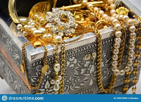 A Treasure Chest Full Of Jewels Pearls And Gold Stock Photo Image