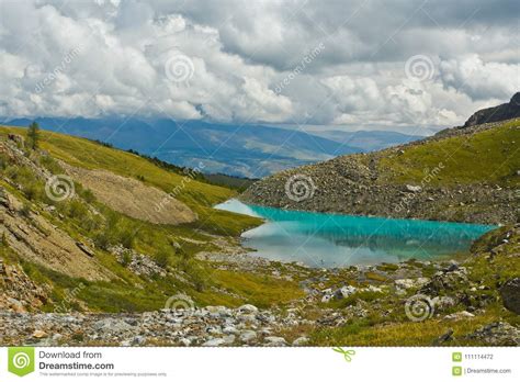 Beautifull Valley With View To Mountains And Turquoise Lake Stock Photo