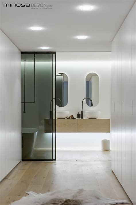 Easy to clean tile in your bathroom with jacuzzi bath remodel. Minosa: Clean, Simple lines. Slick bathroom design by Minosa