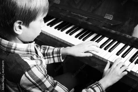 Beautiful Child Playing Piano Black And White Stock Photo Adobe Stock