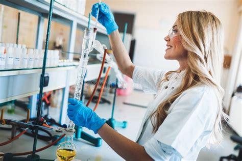 Female Student Of Chemistry Working In Laboratory Stock Photo Image