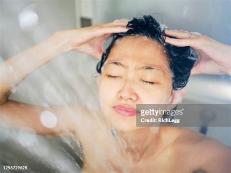 Asian Woman Showering Photos And Premium High Res Pictures Getty Images