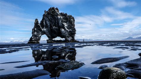 Large Rock Structure Among The Tide Pools In Hvitserkur Iceland Image
