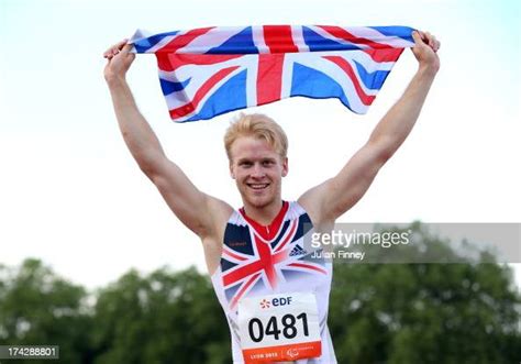 Jonnie Peacock Of Great Britain Celebrates Winning The Mens 100m T44