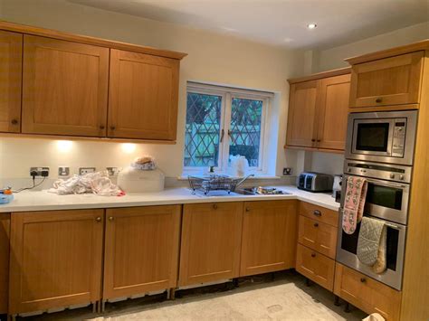 The kitchen over featuresyou can paint the cabinet doors on or off the cabinet, but eliminating them eases painting. Kitchen Cabinet Painters in Kent / Kitchen door painters ...