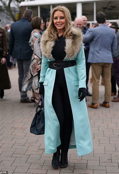 carol vorderman 62 cuts a stylish figure in a fur trimmed coat as she arrives at cheltenham