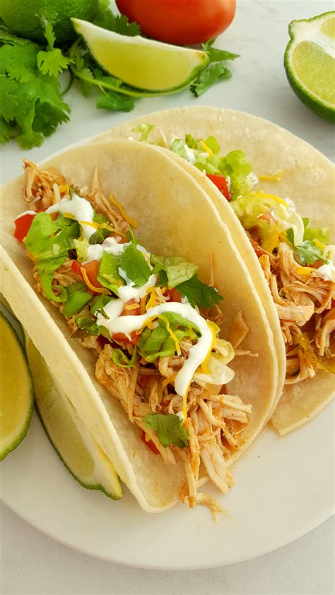 The flavor is just amazing and the entire family goes crazy over it. Crock Pot Shredded Chicken Tacos - Tales of a Ranting Ginger