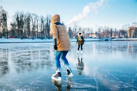 Ice Skating On The Frozen Lake Stock Photo Download Image Now Istock