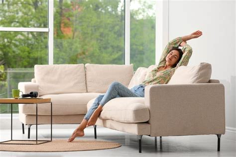 Young Woman Relaxing On Sofa Stock Image Image Of Couch Break 221288491