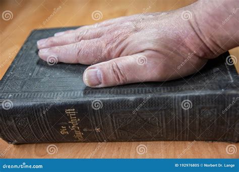 Man Puts Hand On The Bible Stock Image Image Of Culture 192976805