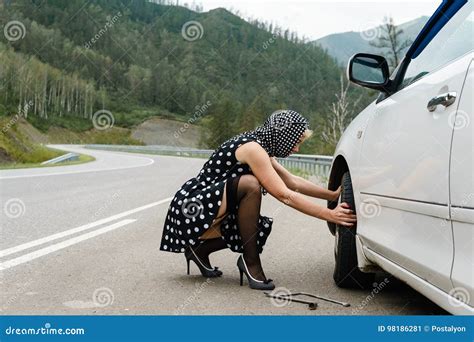 Pin Up Woman Changing Car Tire On Road Stock Image Image Of Broke Mountain