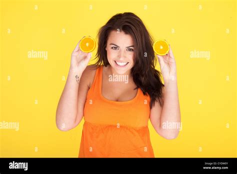 Cute Cheeky Woman Having Fun With Oranges Beautiful Woman Cheeky