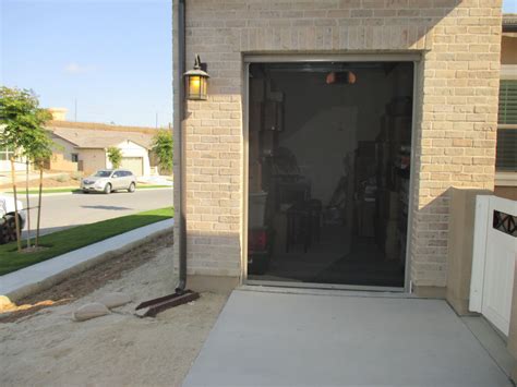 Panoramalite Pull Down Retractable Screen For A Single Car Garage Door
