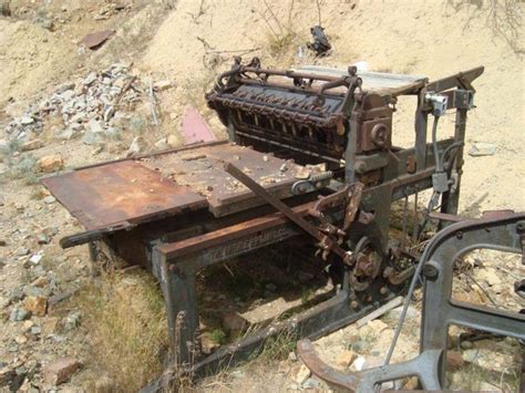 An Ancient Printing Press That Serves As One Of The Primary Images For