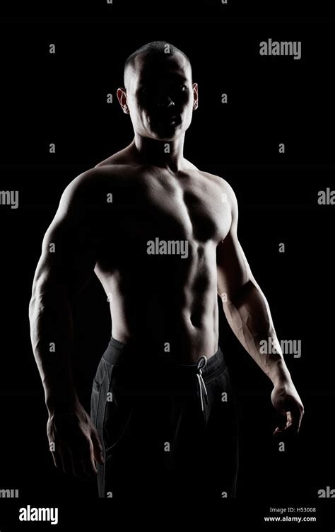 Silhouette Of A Strong Man Stock Photo Alamy