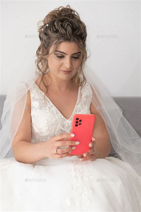 Beautiful Bride Taking Selfie Self Portrait With Red Mobile Phone Stock
