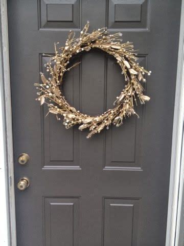 Painting your front door can be a great way to create a welcoming space for guests. Bobi Law Designs....Sherwin Williams "Urban Bronze" color ...